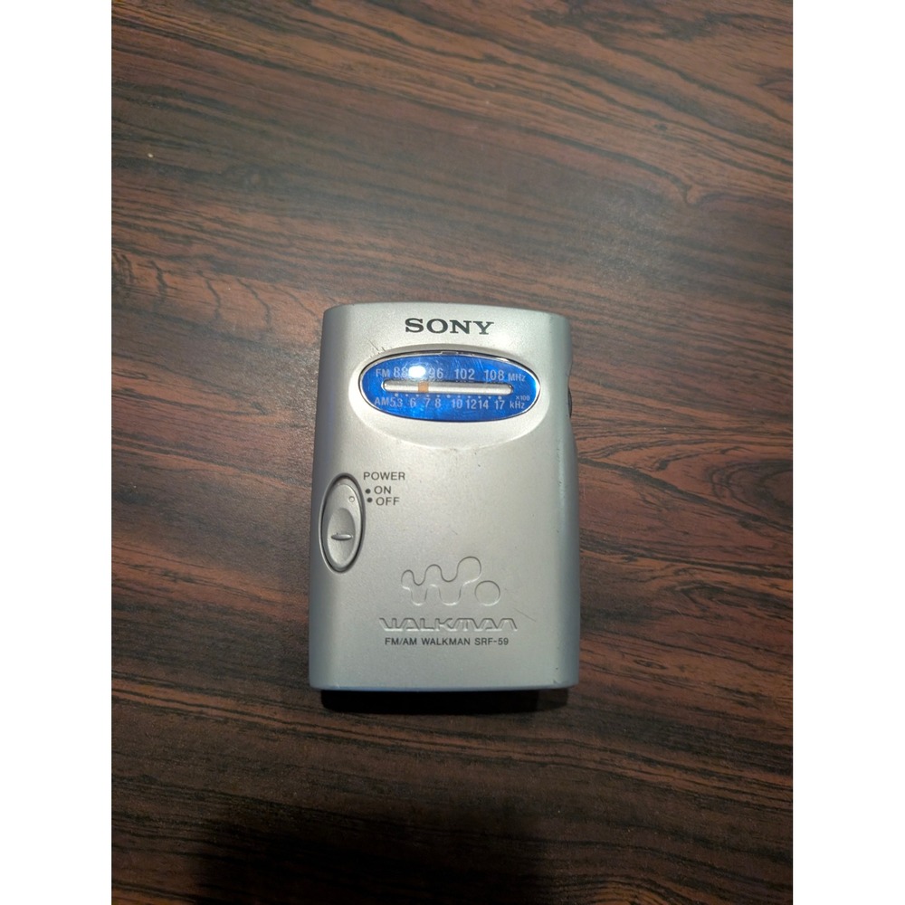 Sony SRF-59 AM/FM Walkman Portable Pocket Radio Silver Analog Tuner Belt Clip